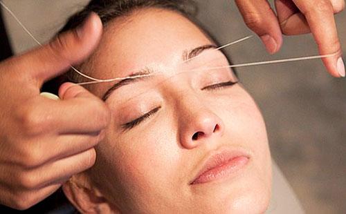 Threading facial hair