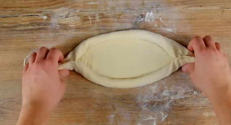 Upang makagawa ng isang bangka ng khachapuri, hugis