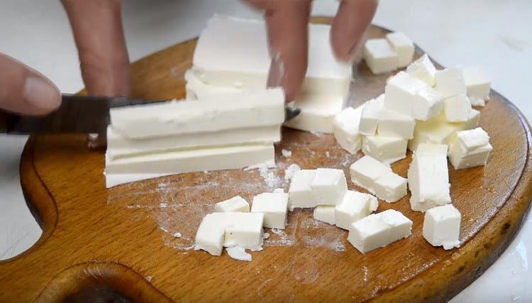 Dice feta cheese.